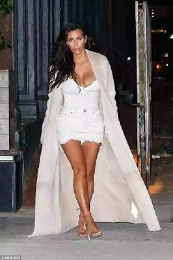 Kim Kardashian steps out in sexy white ensemble on dinner date with Kanye West